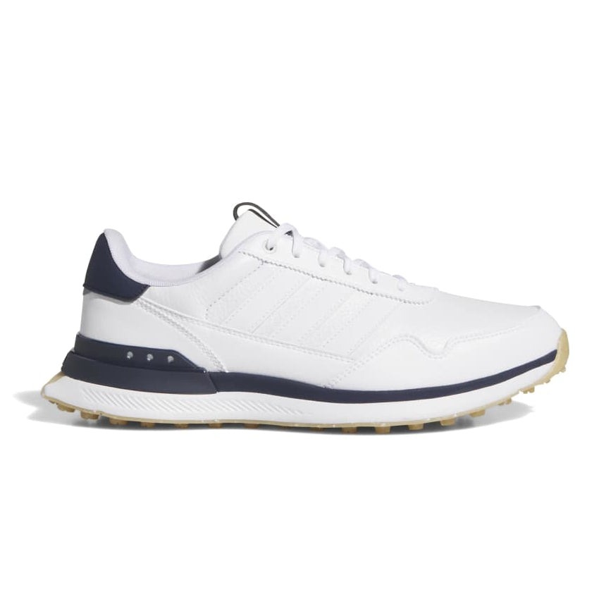 White sneaker with navy accents on a white background