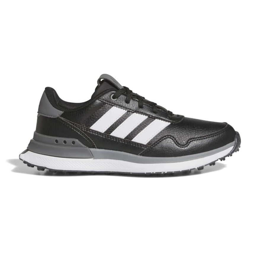 Black Adidas sneaker with white stripes on a white background