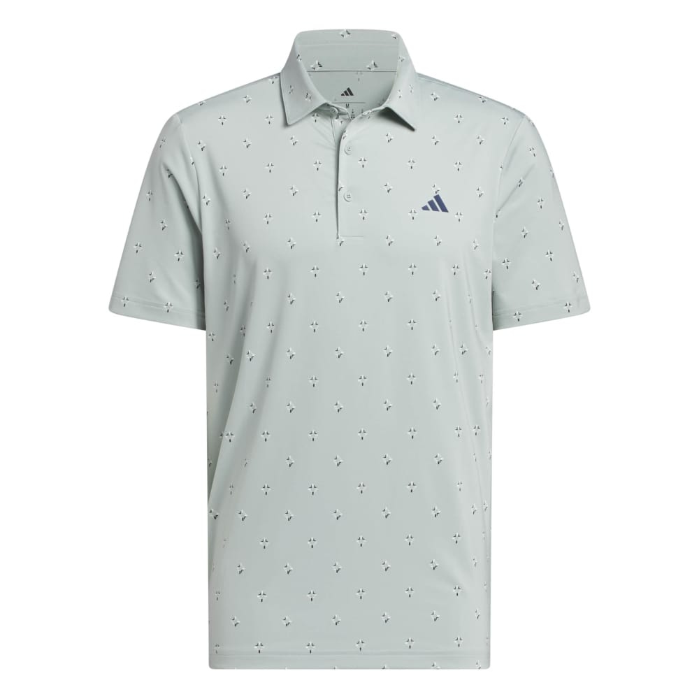 Light sage polo shirt with subtle pattern and Adidas logo on a white background